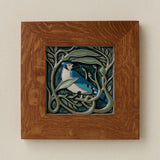 Rookwood Serviceberry Blue Jay revival bird art tile in a golden oak wood frame