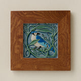 Rookwood Winterberry Blue Jay revival bird art tile in a golden oak wood frame