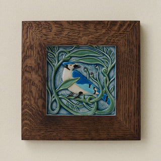 Rookwood Winterberry Blue Jay revival bird art tile in a dark walnut wood frame