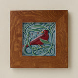 Rookwood Winterberry Cardinal revival bird art tile in a golden oak wood frame