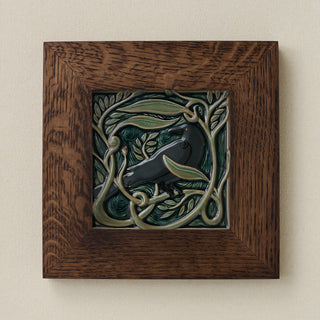 Rookwood Serviceberry Rook revival bird art tile in a dark walnut wood frame