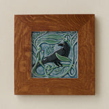 Rookwood Winterberry Rook revival bird art tile in a golden oak wood frame