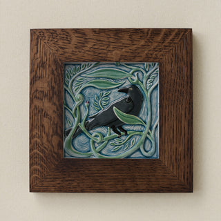 Rookwood Winterberry Rook revival bird art tile in a dark walnut wood frame