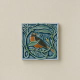 Hand-painted Rookwood Winterberry Robin revival bird art tile in cool blue winter tones, unframed