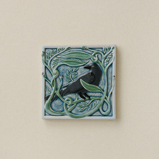Hand-painted Rookwood Winterberry Rook revival bird art tile in cool blue winter tones, unframed