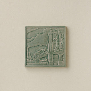 Green Rookwood City Scene art tile featuring the Roebling Bridge in Cincinnati, unframed