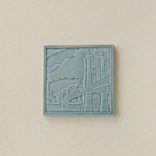 Blue decorative tile of Roebling Bridge