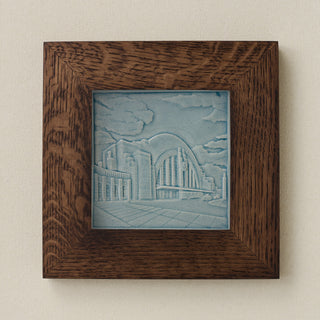 Rookwood Union Terminal City Scene art tile in a dark walnut wood frame