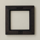 Back of Rookwood 8x8 ebony Craftsman tile frame showing construction and hanging slot