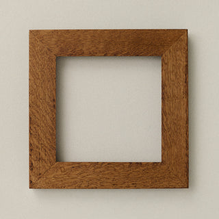 Rookwood 8x8 Craftsman tile frame in golden oak with visible wood grain and thick border design