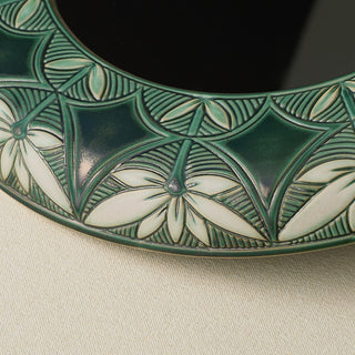 Close-up details of the one-of-a-kind mirror.
