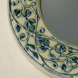 Close-up details of the one-of-a-kind mirror.