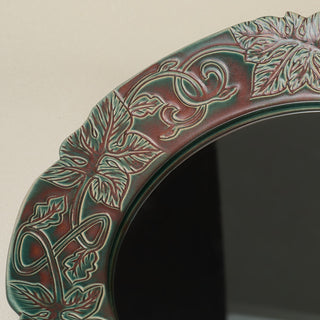 Close-up details of the one-of-a-kind mirror.