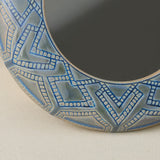 Close-up details of the one-of-a-kind mirror.