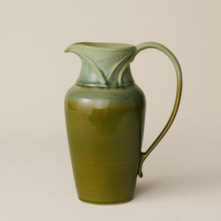 Hand-thrown and hand-glazed ceramic pitcher by Rookwood Pottery