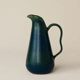 Hand-thrown and hand-glazed ceramic pitcher by Rookwood Pottery