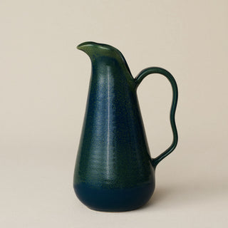 Hand-thrown and hand-glazed ceramic pitcher by Rookwood Pottery