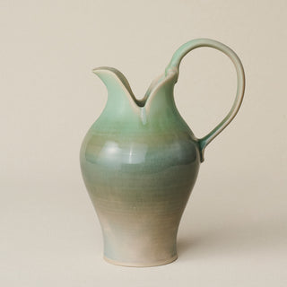 Hand-thrown and hand-glazed ceramic pitcher by Rookwood Pottery