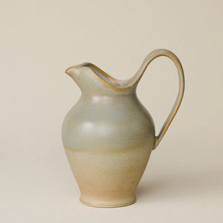 Hand-thrown and hand-glazed ceramic pitcher by Rookwood Pottery