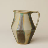 Hand-thrown and hand-glazed ceramic pitcher by Rookwood Pottery