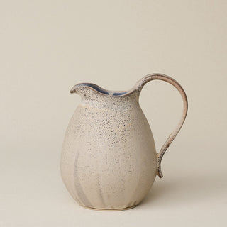 Hand-thrown and hand-glazed ceramic pitcher by Rookwood Pottery