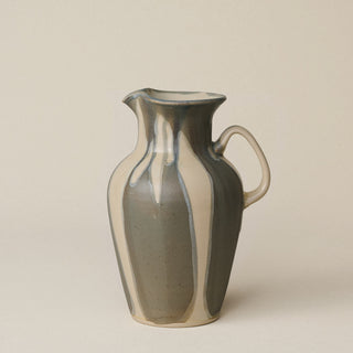 Hand-thrown and hand-glazed ceramic pitcher by Rookwood Pottery