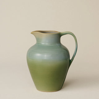 Hand-thrown and hand-glazed ceramic pitcher by Rookwood Pottery
