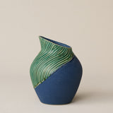Hand-thrown and hand-glazed ceramic vase by Rookwood Pottery
