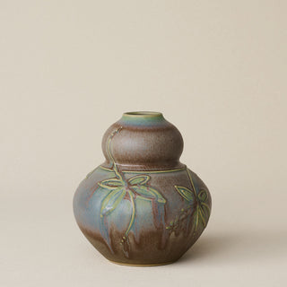 Hand-thrown and hand-glazed ceramic vase by Rookwood Pottery