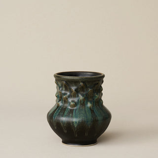 Hand-thrown and hand-glazed ceramic vase by Rookwood Pottery