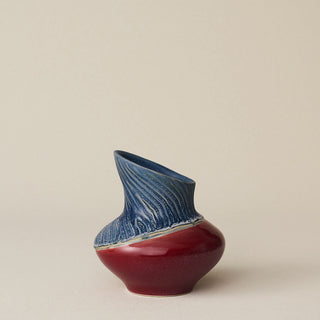 Hand-thrown and hand-glazed ceramic vase by Rookwood Pottery