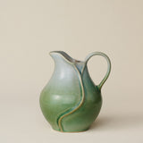 Hand-thrown and hand-glazed ceramic pitcher by Rookwood Pottery