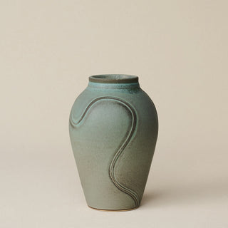 Hand-thrown and hand-glazed ceramic vase by Rookwood Pottery