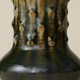 Close-up details of the one-of-a-kind vase.