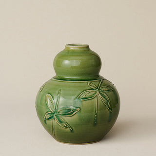 Hand-thrown and hand-glazed ceramic vase by Rookwood Pottery