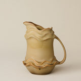 Hand-thrown and hand-glazed ceramic pitcher by Rookwood Pottery
