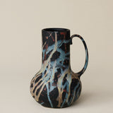 Hand-thrown and hand-glazed ceramic vase by Rookwood Pottery