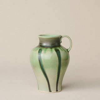 Hand-thrown and hand-glazed ceramic vase by Rookwood Pottery
