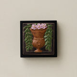 Sculpted decorative tile in wood frame by Rookwood