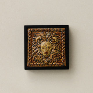 Sculpted decorative tile in wood frame by Rookwood