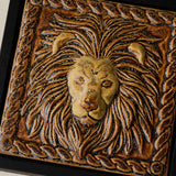 Close-up details of the sculpted tile, with visible carvings and layered glaze.