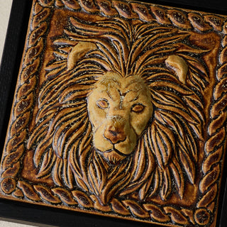 Close-up details of the sculpted tile, with visible carvings and layered glaze.