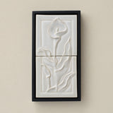 Sculpted decorative tile in wood frame by Rookwood
