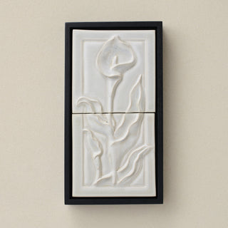Sculpted decorative tile in wood frame by Rookwood