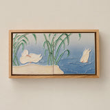 Sculpted decorative tile in wood frame by Rookwood