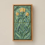 Sculpted decorative tile in wood frame by Rookwood