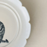 Close-up details of the one-of-a-kind plate.