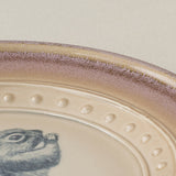 Close-up details of the one-of-a-kind plate.