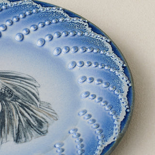 Close-up details of the one-of-a-kind plate.
