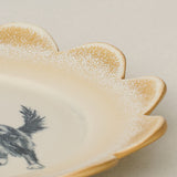 Close-up details of the one-of-a-kind plate.